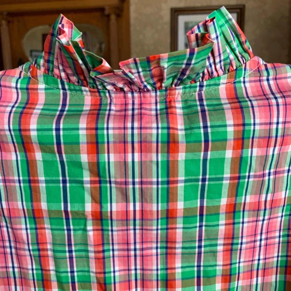 Haley and the hound preppy ruffle neck tunic. Not brand new, but never worn‎